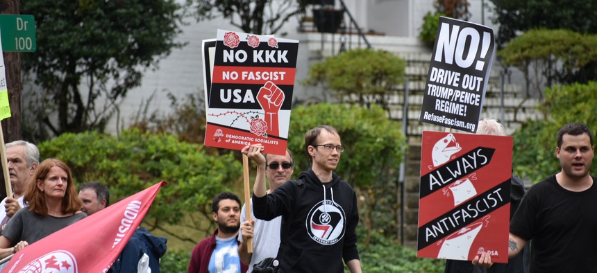 Residents of Greensboro, North Carolina, protest President Trump's arrival for a fundraiser in 2017.
