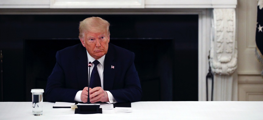 President Donald Trump listens during a roundtable discussion with law enforcement officials on June 8, 2020, at the White House.