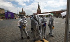 Volunteers wearing face masks, gloves and protective gear to protect against coronavirus in Moscow, Russia, Saturday, June 6, 2020. Volunteers wearing face masks, gloves and protective gear to protect against coronavirus in Moscow, Russia, Saturday, June 6, 2020.