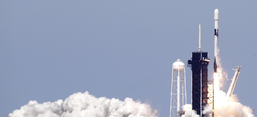 A Falcon 9 SpaceX rocket with the seventh batch of approximately 60 satellites for SpaceX's Starlink broadband network, lifts off from pad 39A at the Kennedy Space Center in Cape Canaveral, Fla., Wednesday, April 22, 2020.