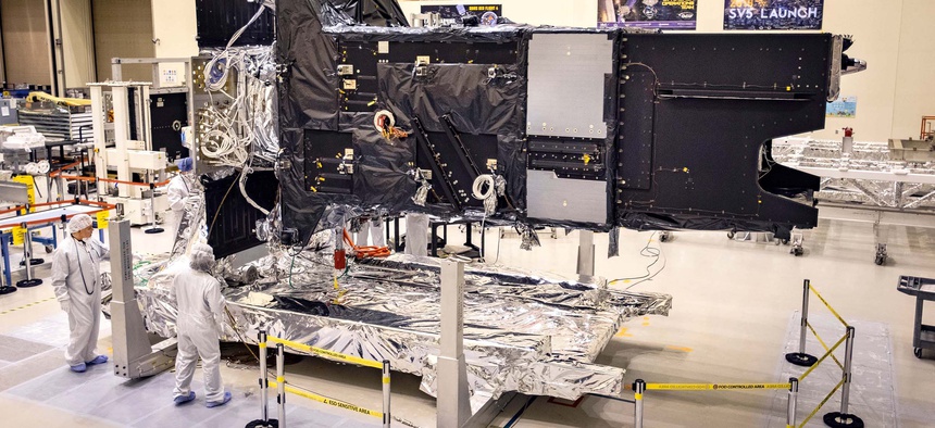 Lockheed Martin's fully-assembled SBIRS GEO 5 missile warning satellite moves into the Thermal Vacuum (TVAC) test chamber on April 1, 2020.