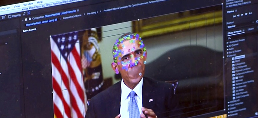This image made from video of a fake video featuring former President Barack Obama shows elements of facial mapping used in new technology that lets anyone make videos of real people appearing to say things they've never said.