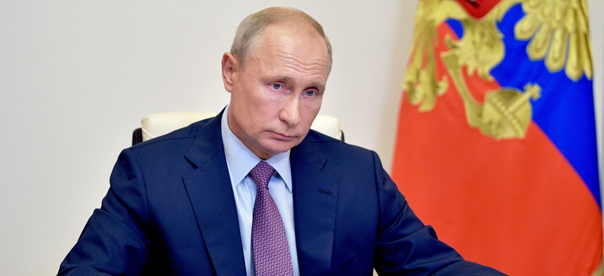 Russian President Vladimir Putin chairs a meeting of Pobeda (Victory) organizing committee via teleconference at the Novo-Ogaryovo residence outside Moscow, Russia, Thursday, July 2, 2020.