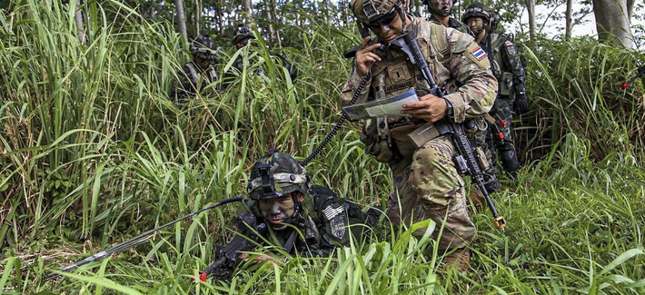 U.S. and Thai soldiers train together at Kahuku Training Area, Hawaii, July 12, 2020, during Lightning Forge, an exercise designed to achieve interoperability with allies.