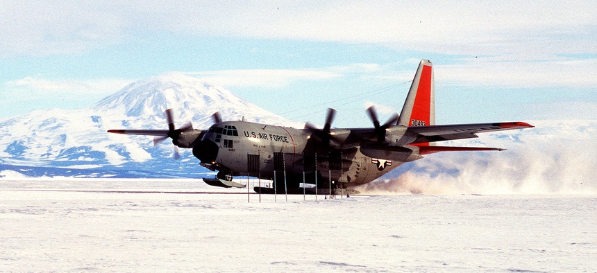 A U.S. Air Force LC-130 Hercules from the New York Air National Guard's 109th Airlift Wing touches down near McMurdo, Antarctica. The first plane landed there 50 years ago.