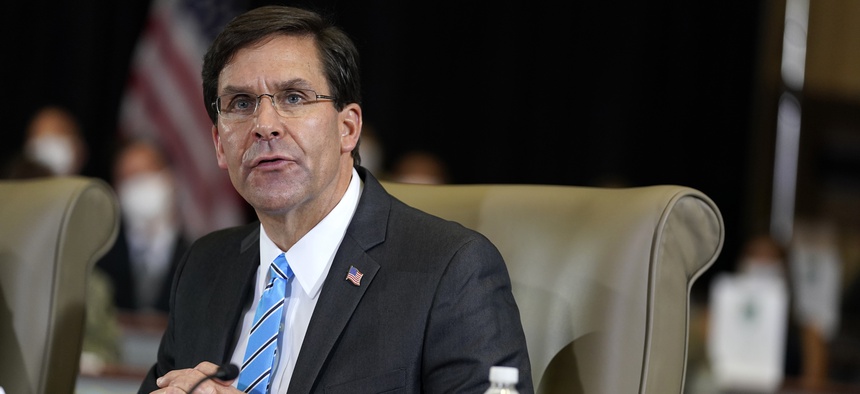 In this July 10, 2020, file photo Defense Secretary Mark Esper speaks during a briefing on counternarcotics operations at U.S. Southern Command in Doral, Fla.
