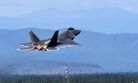 A U.S. Air Force F-22 Raptor takes off for training during exercise Arctic ACE at Joint Base Elmendorf-Richardson, Alaska, July 17, 2017.