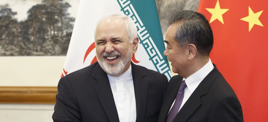 Chinese Foreign Minister Wang Yi meets Iranian Foreign Minister Mohammad Javad Zarif at the Diaoyutai State Guesthouse in Beijing, Friday, May 17, 2019.