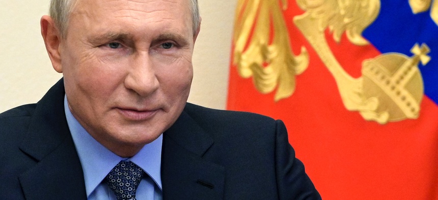 Russian President Vladimir Putin chairs a Security Council meeting via videoconference at the Novo-Ogaryovo residence outside Moscow, Russia, Friday, July 17, 2020.