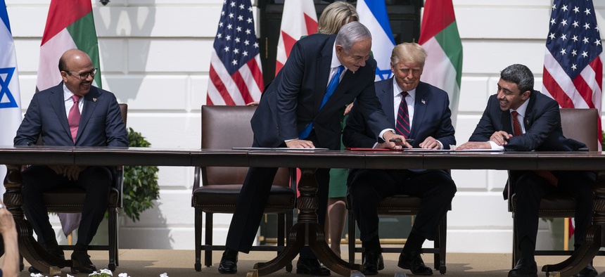 Bahrain Foreign Min. Khalid bin Ahmed Al Khalifa, left, Israeli Prime Minister Benjamin Netanyahu, President Donald Trump, and UAE Foreign Min. Abdullah bin Zayed al-Nahyan at the Abraham Accords signing, the White House, Tuesday, Sept. 15, 2020.