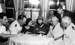 Fidel Castro aboard MS Berlin North German Lloyd cruise ship in Havana harbor. Left to right: First officer Ernest Hankiewicz; captain's daughter Marita Lorenz; Castro; Capt. Heinrich Lorenz, chief enginer Karl Kase. 