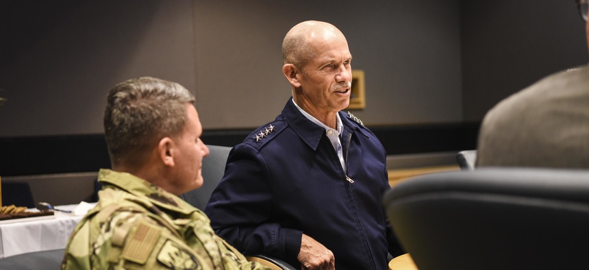 U.S. Coast Guard Vice Commandant Charles Ray speaks with members of Lockheed Martin and Defense Contract Management Agency Col. Lance French at a briefing at the Lockheed Martin facility in Marietta, Ga., Oct. 23, 2018.