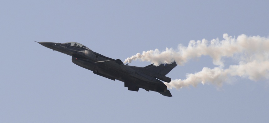 A Hellenic Air Force F-16 takes part at the annual military parade at the northern port city of Thessaloniki, Greece during a military parade, Sunday, Oct. 28, 2018.
