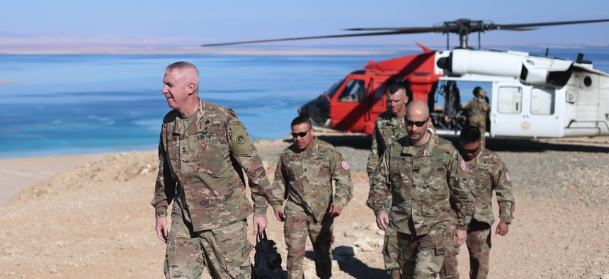 Maj. Gen. John Sullivan, commanding general, 1st Theater Sustainment Command, visits with soldiers assigned to Task Force Sinai in Egypt in 2019.