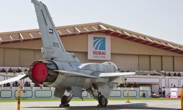 The UAE Block 60 F-16 stands strong out in front of the Dubai Airshow hanger.