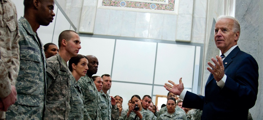Then-U.S. Vice President Joe Biden talks with troops at Victory Base Complex, Iraq, in 2011.
