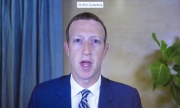 Facebook CEO of Mark Zuckerberg appears on a screen as he speaks remotely during a hearing before the Senate Commerce Committee on Capitol Hill, Wednesday, Oct. 28, 2020, in Washington.