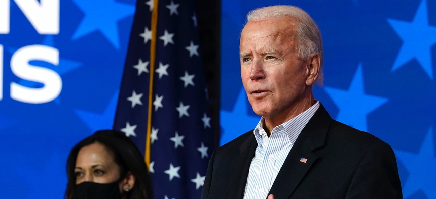 Democratic presidential candidate former Vice President Joe Biden speaks Thursday, Nov. 5, 2020, in Wilmington, Del. Democratic vice presidential candidate Sen. Kamala Harris, D-Calif., stands at left.