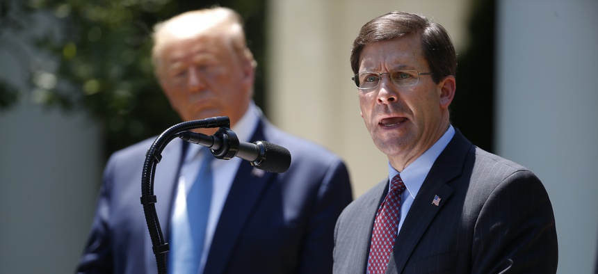 President Donald Trump listens during a press briefing about the coronavirus in the Rose Garden of the White House, Friday, May 15, 2020, in Washington.