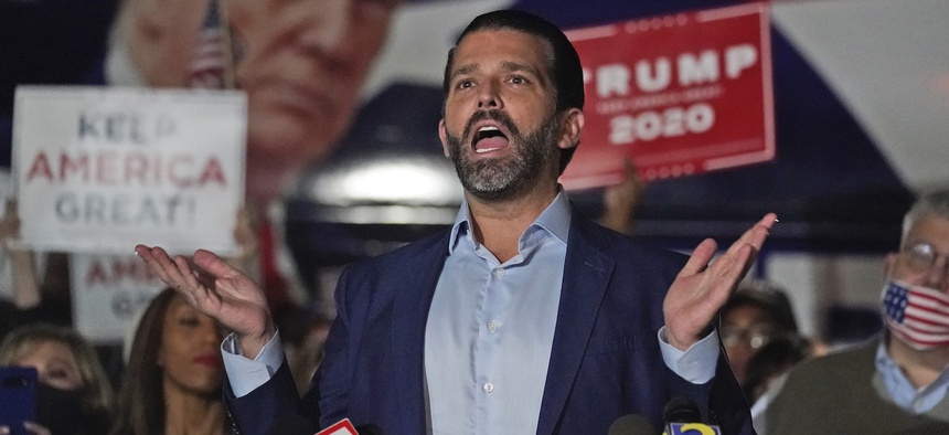 Donald Trump Jr., gestures during a news conference at Georgia Republican Party headquarters Thursday, Nov. 5, 2020 in Atlanta