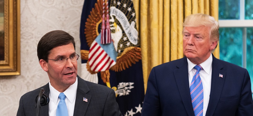Then-Defense Secretary Mark Esper speaks at the White House in July 2019.