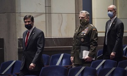 Defense Secretary Mark Esper, Chairman of the Joint Chiefs of Staff Gen. Mark Milley and Rep. Mac Thornberry, R-Texas, arrive for a House Armed Services Committee hearing on Thursday, July 9, 2020, on Capitol Hill in Washington.
