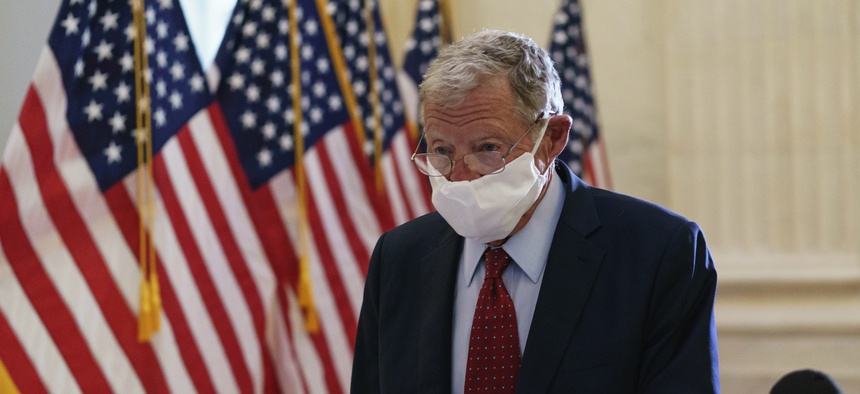 Senate Armed Services Committee Chairman Sen. Jim Inhofe, R-Okla., arrives as Senate Republicans hold leadership elections, on Capitol Hill in Washington on Nov. 10, 2020.