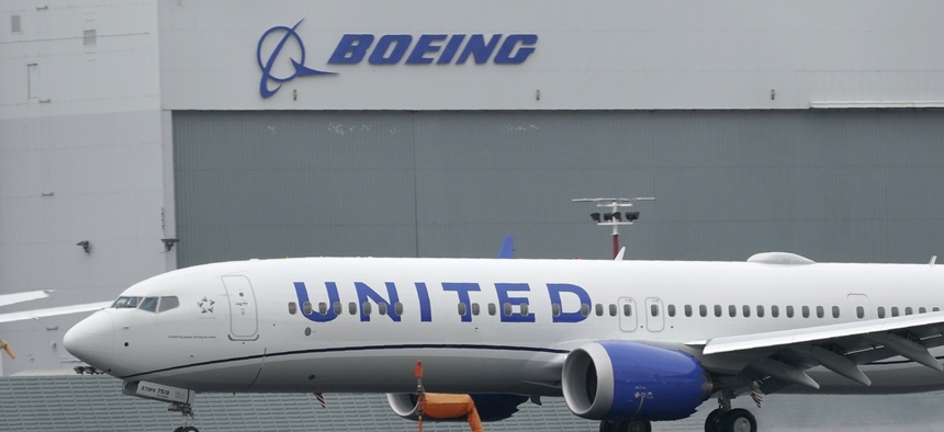 A Boeing 737 Max 9 built for United Airlines lands at King County International Airport - Boeing Field after a test flight from Moses Lake, Wash., Wednesday, Nov. 18, 2020, in Seattle.
