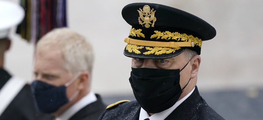 Joint Chiefs Chairman Gen. Mark Milley attends a Veterans Day wreath laying ceremony led by President Donald Trump at the Tomb of the Unknown Soldier at Arlington National Cemetery in Arlington, Va., Wednesday, Nov. 11, 2020.