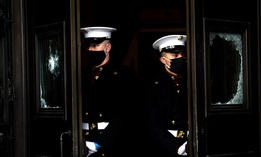 U.S. Marine Corps. hold the damaged Capitol doors during a rehearsal for the 59th inaugural ceremony for President-elect Joe Biden and Vice President-elect Kamala Harris on Monday, Jan. 18, 2021 at the U.S. Capitol in Washington.