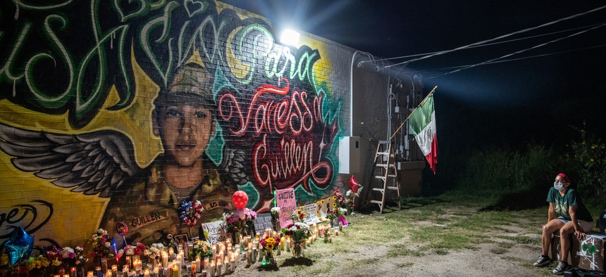 People pay respects at a mural of Vanessa Guillen, a soldier based at nearby Fort Hood on July 6, 2020 in Austin, Texas.