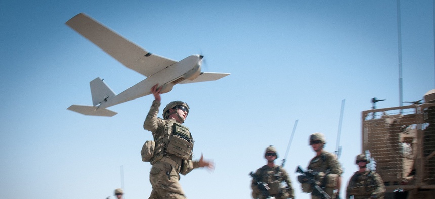 U.S. Army Chief Warrant Officer 2 Dylan Ferguson, a brigade aviation element officer with the 82nd Airborne Division's 1st Brigade Combat Team, launches a Puma unmanned aerial vehicle June 25, 2012, Ghazni Province, Afghanistan.