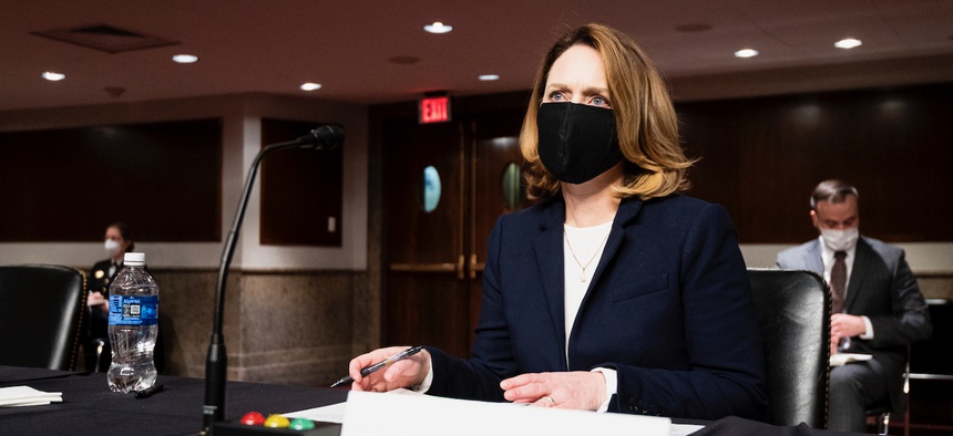 Kathleen Hicks, nominee to be Deputy Secretary Of Defense, prepares to testify during her confirmation hearing in the Senate Armed Services Committee on Tuesday, Feb. 2, 2021.