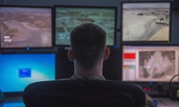 Staff Sgt. Dakota Karlsen, 455th Expeditionary Security Forces Squadron, echo sector controller, looks at a monitor of the surrounding area around the base, Bagram Airfield, Afghanistan, Aug. 4, 2016. 