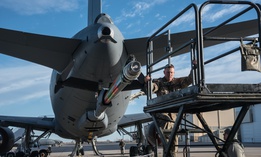 Master Sgt. Chris Hughes, 22nd Maintenance Squadron hydraulics craftsman, climbs onto a B4 stand to begin an acceptance inspection on a KC-46A Pegasus boom Feb. 14, 2019, at McConnell Air Force Base.